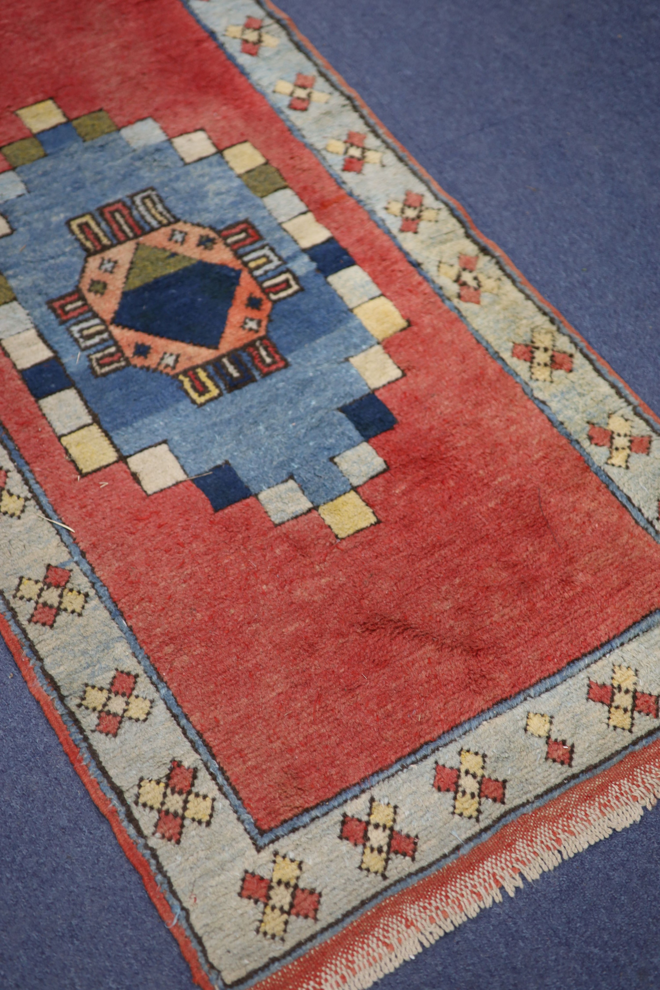 Two Caucasian design runners, larger 350 x 74cm